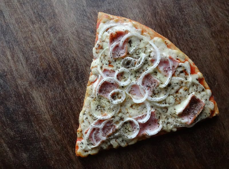 Hawaiian pizza with ham and fresh pineapple