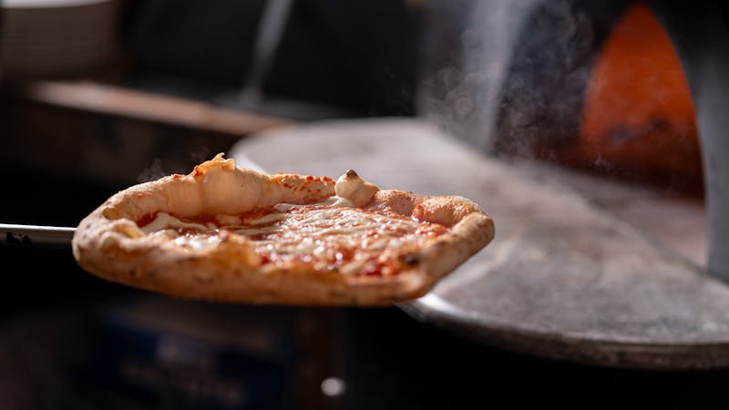Margherita pizza with fresh tomato and basil